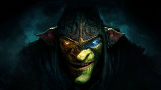 A close-up of Styx looking up from under his hood in darkness, one eye glowing amber, and the other light blue